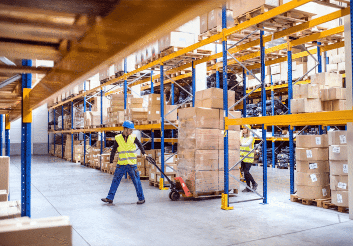 Warehouse racks and warehouse worker