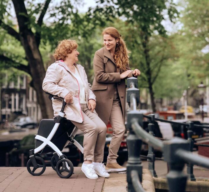 Carer and patient on a day trip near a canal